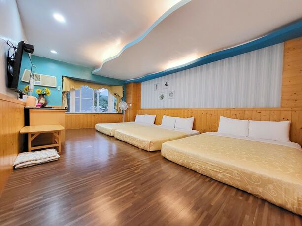 Imagen de la habitación del Hotel Xing Ji. Foto 15