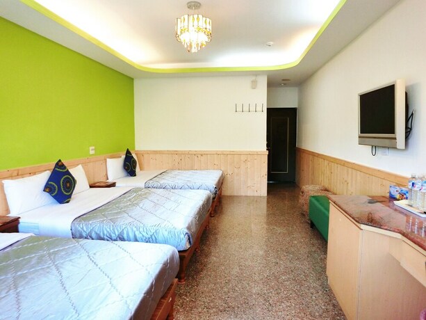 Imagen de la habitación del Hotel Xing Ji. Foto 16