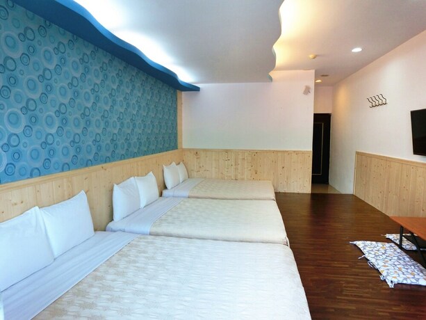 Imagen de la habitación del Hotel Xing Ji. Foto 17