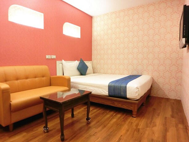 Imagen de la habitación del Hotel Xing Ji. Foto 18