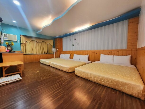 Imagen de la habitación del Hotel Xing Ji. Foto 20
