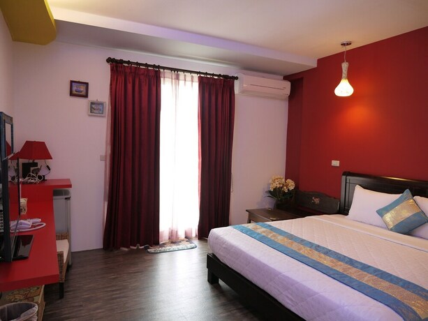 Imagen de la habitación del Hotel Xing Ji. Foto 21