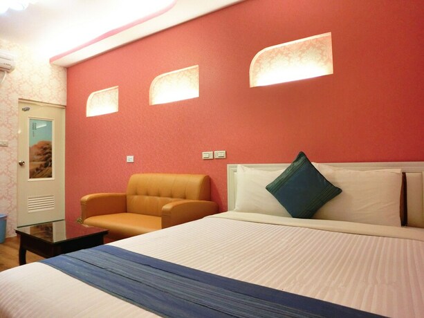 Imagen de la habitación del Hotel Xing Ji. Foto 23