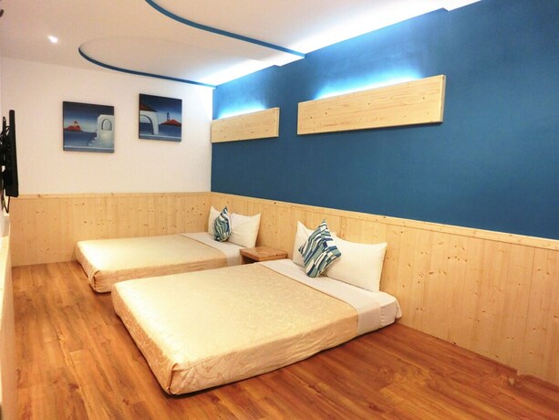 Imagen de la habitación del Hotel Xing Ji. Foto 24