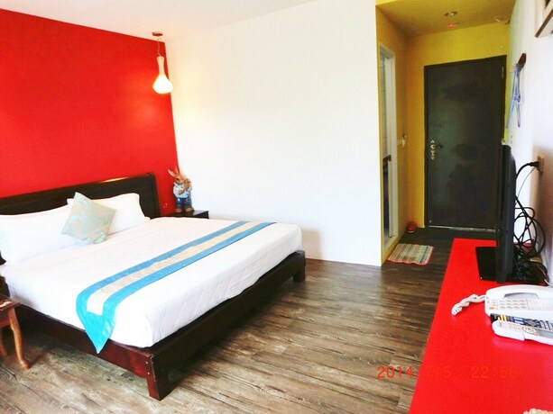 Imagen de la habitación del Hotel Xing Ji. Foto 26