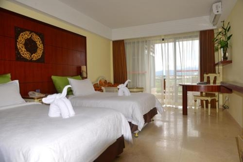 Imagen de la habitación del Hotel Xing Long Old Ban Yan Resort & Spa. Foto 6