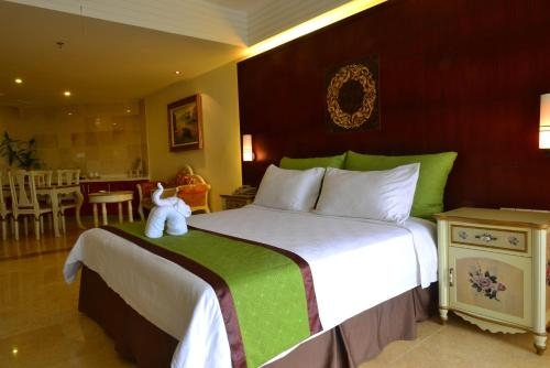 Imagen de la habitación del Hotel Xing Long Old Ban Yan Resort & Spa. Foto 8