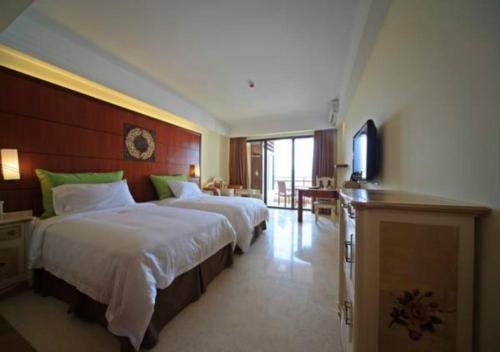 Imagen general del Hotel Xing Long Old Ban Yan Resort & Spa. Foto 3