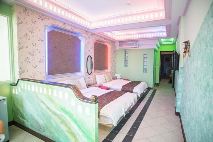 Imagen de la habitación del Hotel Xing Yu Inn. Foto 17