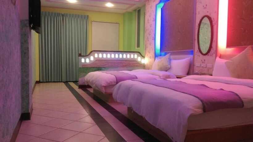 Imagen de la habitación del Hotel Xing Yu Inn. Foto 21