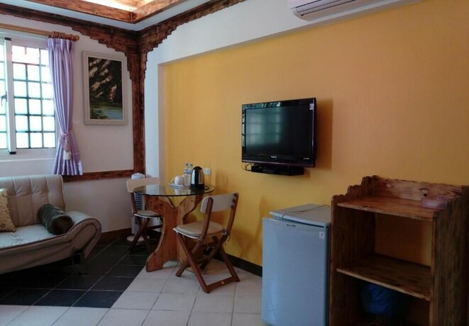 Imagen de la habitación del Hotel Xing Yu Inn. Foto 22