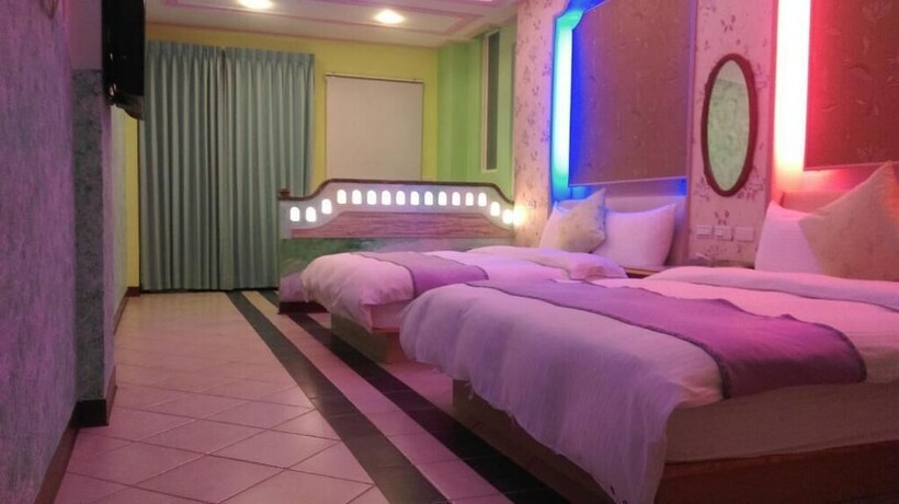 Imagen de la habitación del Hotel Xing Yu Inn. Foto 23