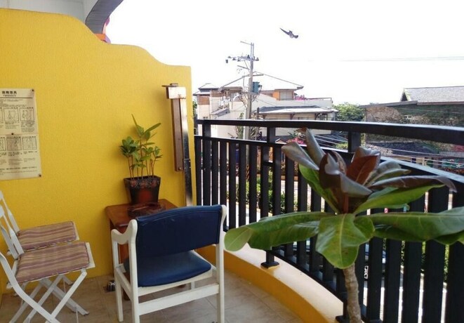 Imagen de la habitación del Hotel Xing Yu Inn. Foto 34