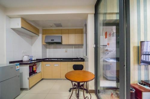 Imagen de la habitación del Hotel Xing Yu Legend Service Apartment Canton Fair Branc. Foto 8