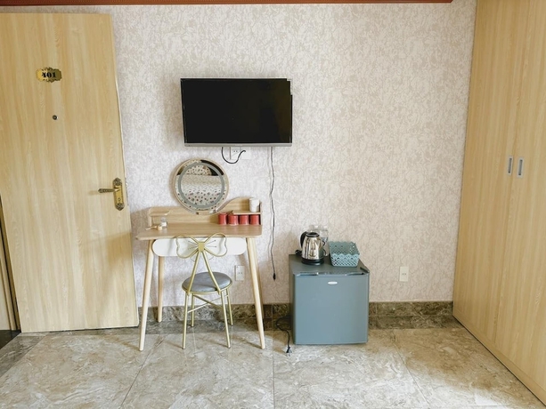 Imagen de la habitación del Hotel Xing city hotel. Foto 11