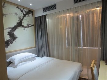 Imagen de la habitación del Hotel Xinghe Business - Railway Station and Yuexiu Park Branch. Foto 2