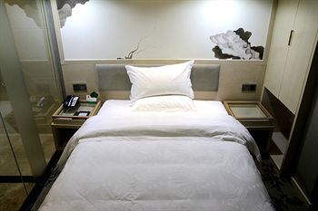 Imagen de la habitación del Hotel Xinghe Business - Railway Station and Yuexiu Park Branch. Foto 8