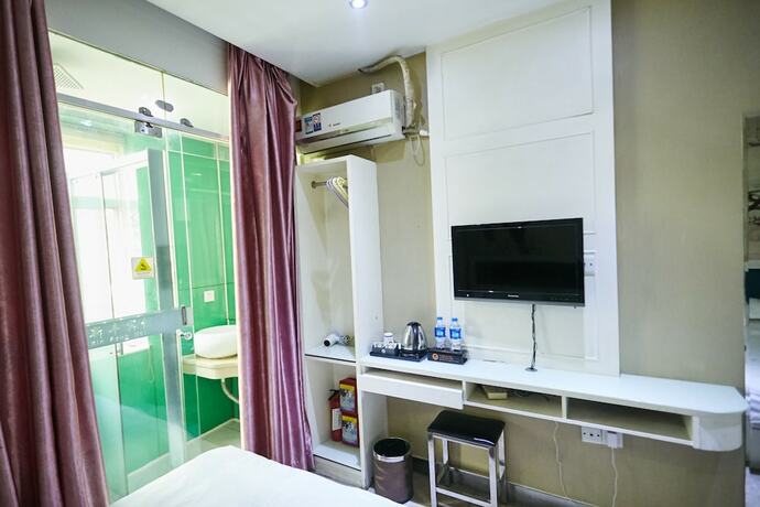 Imagen de la habitación del Hotel Xinghe Xinfeng - Railway Station. Foto 6