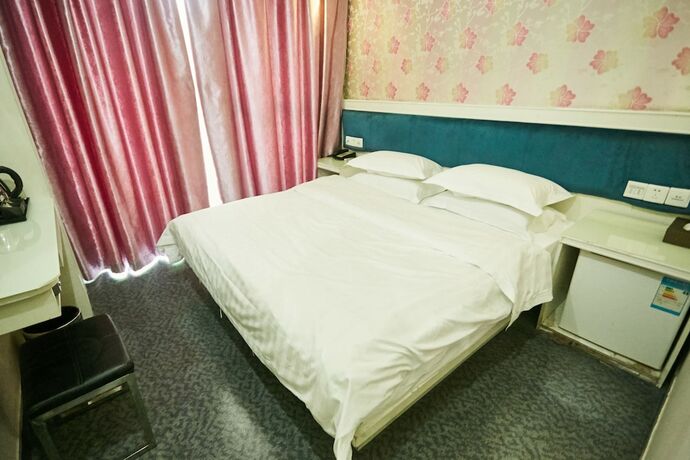 Imagen de la habitación del Hotel Xinghe Xinfeng - Railway Station. Foto 7