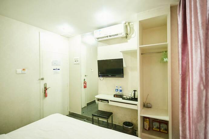 Imagen de la habitación del Hotel Xinghe Xinfeng - Railway Station. Foto 8