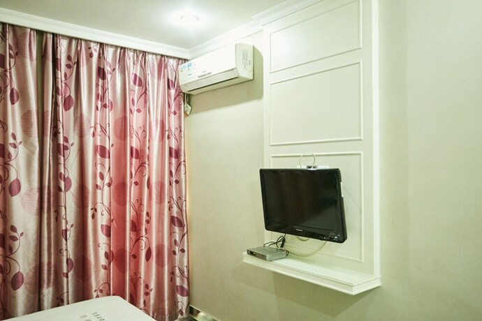 Imagen de la habitación del Hotel Xinghe Xinfeng - Railway Station. Foto 11
