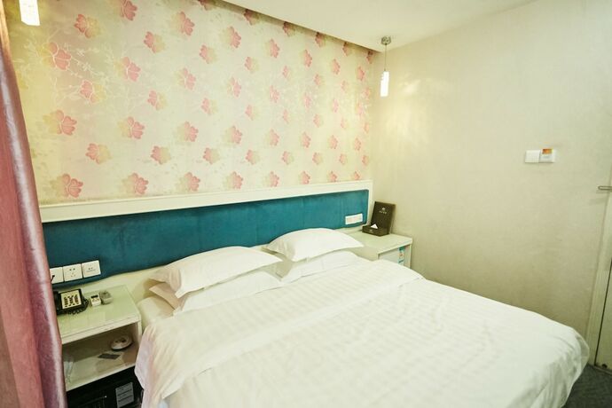 Imagen de la habitación del Hotel Xinghe Xinfeng - Railway Station. Foto 14
