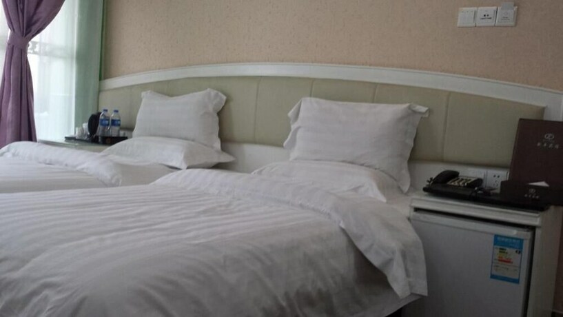 Imagen de la habitación del Hotel Xinghe Xinfeng - Railway Station. Foto 18