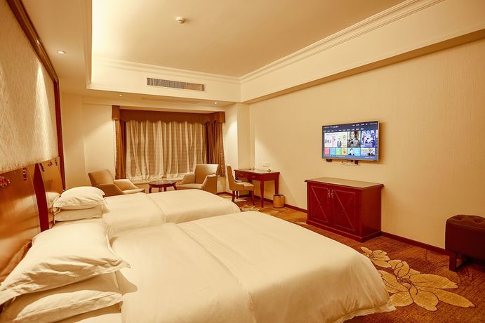 Imagen de la habitación del Hotel Xinghui Hotel Guangzhou. Foto 4