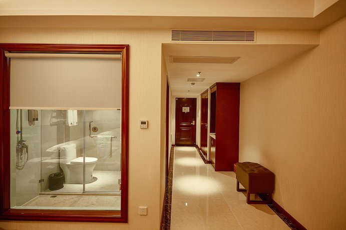 Imagen de la habitación del Hotel Xinghui Hotel Guangzhou. Foto 5