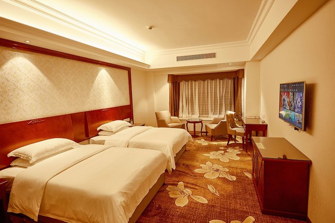 Imagen de la habitación del Hotel Xinghui Hotel Guangzhou. Foto 10