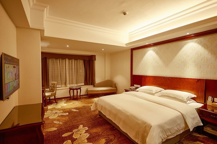Imagen de la habitación del Hotel Xinghui Hotel Guangzhou. Foto 12