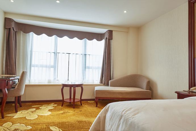 Imagen de la habitación del Hotel Xinghui Hotel Guangzhou. Foto 13