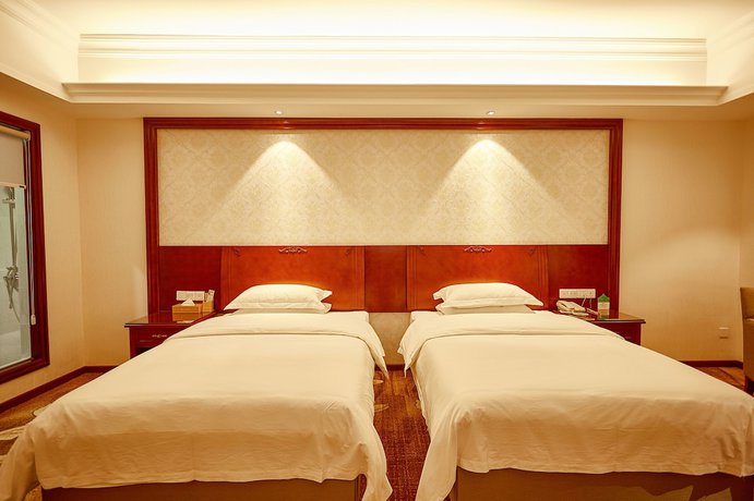 Imagen de la habitación del Hotel Xinghui Hotel Guangzhou. Foto 15