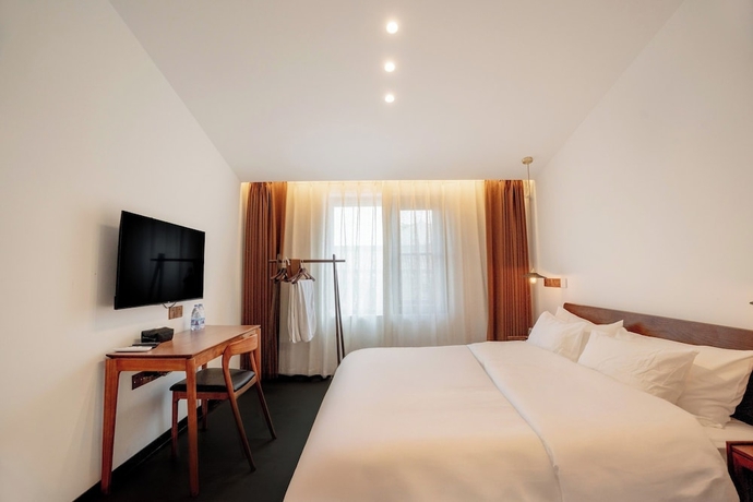 Imagen de la habitación del Hotel Xingle. Foto 8