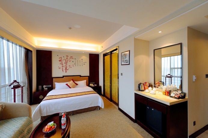Imagen de la habitación del Hotel Xingsha Huatian Grand. Foto 8
