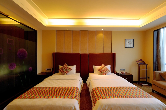 Imagen de la habitación del Hotel Xingsha Huatian Grand. Foto 11
