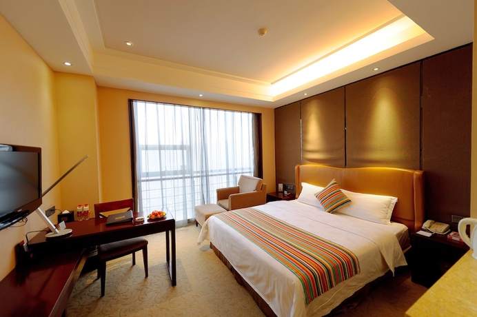 Imagen de la habitación del Hotel Xingsha Huatian Grand. Foto 15