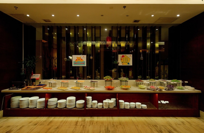 Imagen del bar/restaurante del Hotel Xingsha Huatian Grand. Foto 4