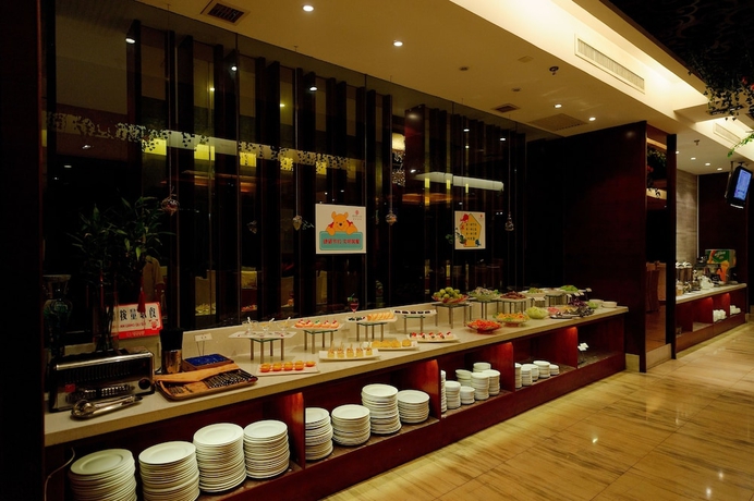 Imagen del bar/restaurante del Hotel Xingsha Huatian Grand. Foto 5