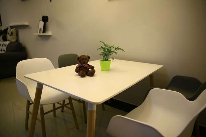 Imagen de la habitación del Hotel Xinguang Apartment. Foto 16