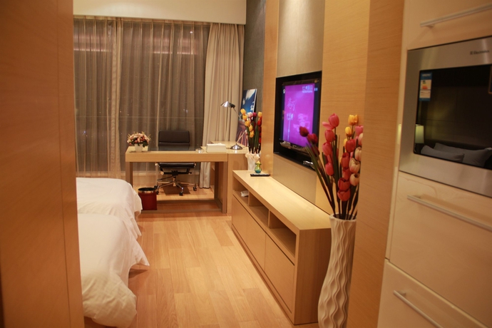 Imagen de la habitación del Hotel Xingyi International Poly Store. Foto 5