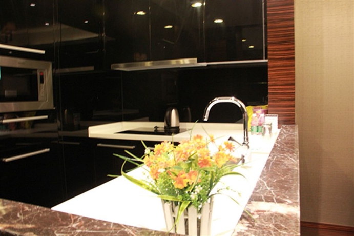 Imagen de la habitación del Hotel Xingyi International Poly Store. Foto 9