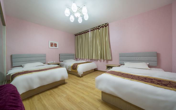 Imagen de la habitación del Hotel Xingyu Boutique. Foto 10
