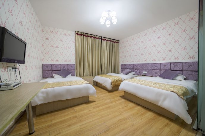 Imagen de la habitación del Hotel Xingyu Boutique. Foto 11