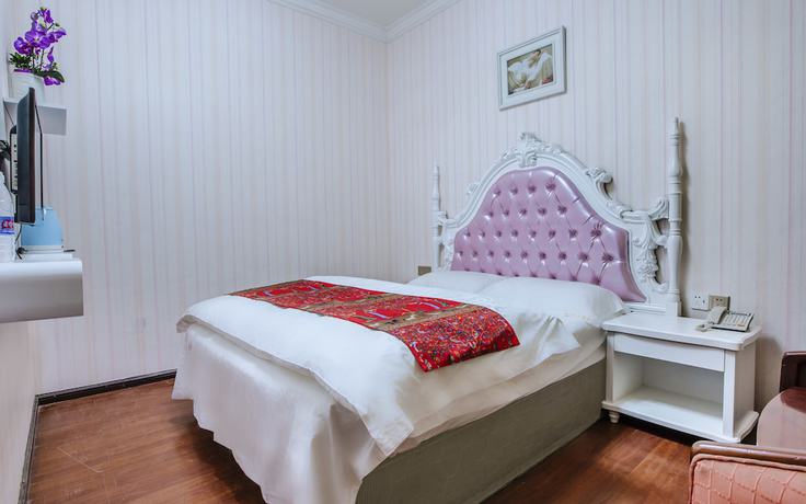 Imagen de la habitación del Hotel Xingyu Boutique. Foto 12