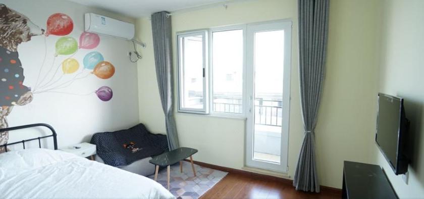 Imagen de la habitación del Hotel Xingyue Shanju Water Town Banshan Villa. Foto 10