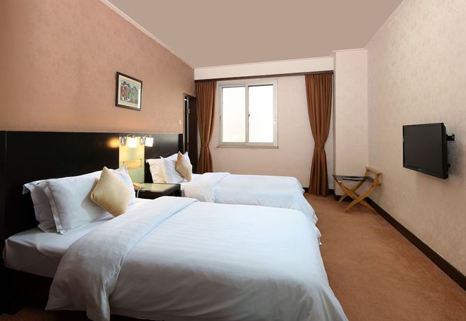 Imagen de la habitación del Hotel Xinhua. Foto 3