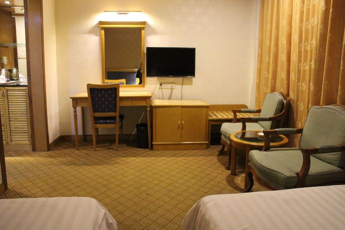 Imagen de la habitación del Hotel Xinhua. Foto 9