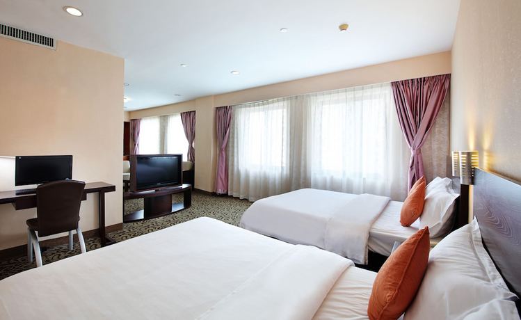 Imagen de la habitación del Hotel Xinhua. Foto 17