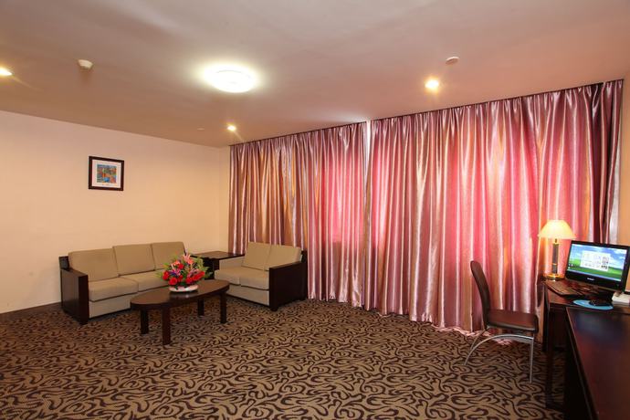 Imagen de la habitación del Hotel Xinhua. Foto 18